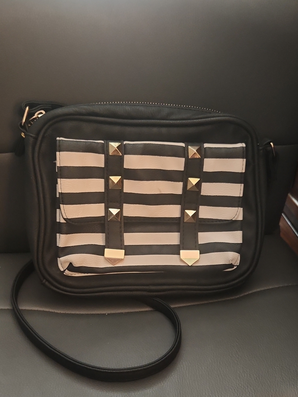Black and Beige Striped Crossbody Bag with Gold Stud Accents